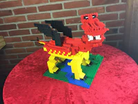 a dragon made out of legos on a table