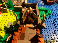a lego set with vikings and a boat on it