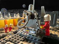 a lego model of a spacecraft on the moon